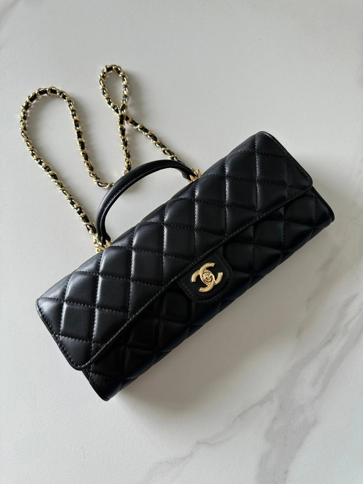 Chanel 2026 Long Top Handle Clutch 25cm Lambskin